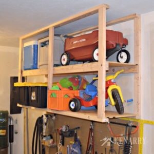 Great idea for ceiling mounted shelves in the garage for better seasonal storage!