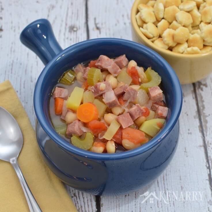 Perfect for a cold day! Slow Cooker White Bean and Ham Soup simmering in the crock pot for dinner.