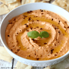 This Roasted Red Pepper Dip is delicious and very simple to make. Serve it with pita chips or crackers for a flavorful and easy appetizer.