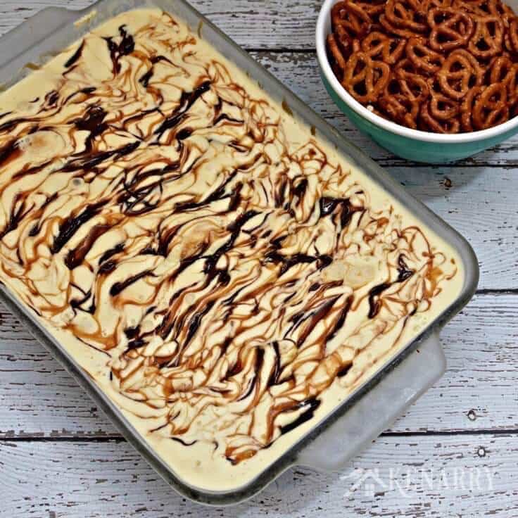 I can't wait to try this recipe idea for Caramel Fudge Ice Cream Cake with a pretzel crust! It looks like a delicious chocolate dessert for a hot summer day or a party with friends.