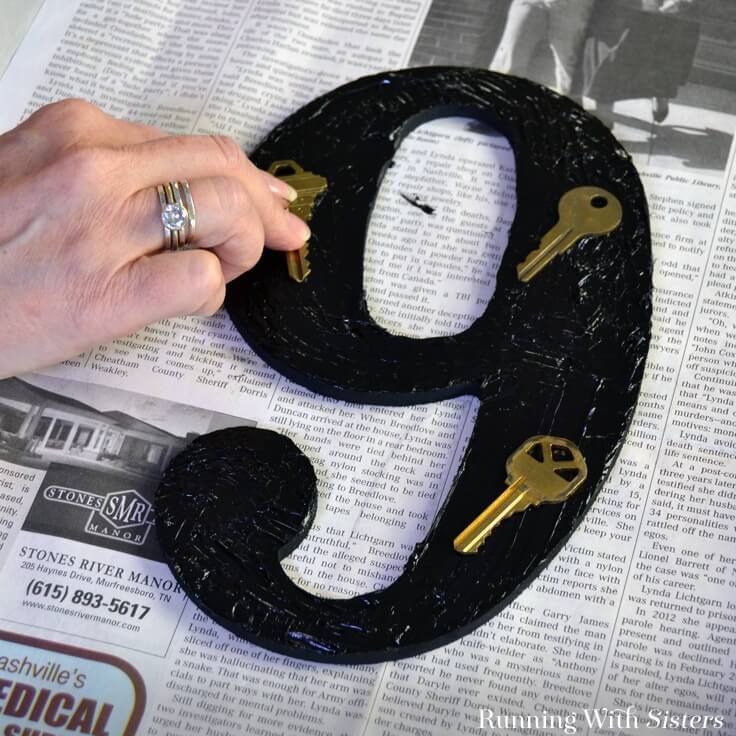 Learn to make DIY mosaic house numbers with this easy tutorial and video! We'll show the easy way to mosaic without grout!