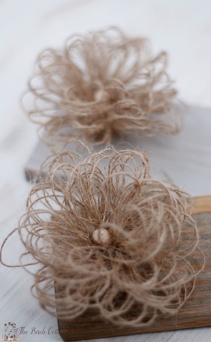 Learn to make these Loopy Burlap Flowers from burlap wrap. Get the full easy to follow tutorial from The Birch Cottage.