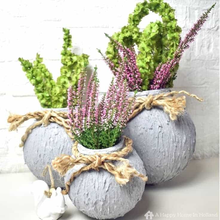 How to create cement look vases from old ball lights in a few easy steps.
