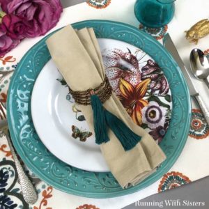 Learn to make DIY Bead And Tassel Napkin Rings. We'll show you every step including how to make handmade tassels made from embroidery floss!