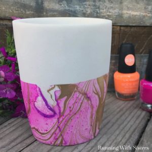 Learn to marble a vase using nail polish and water! It's called suminagashi and we'll show you how to do every step! We've got a how to video plus step by step instructions. This one is fast and fun!