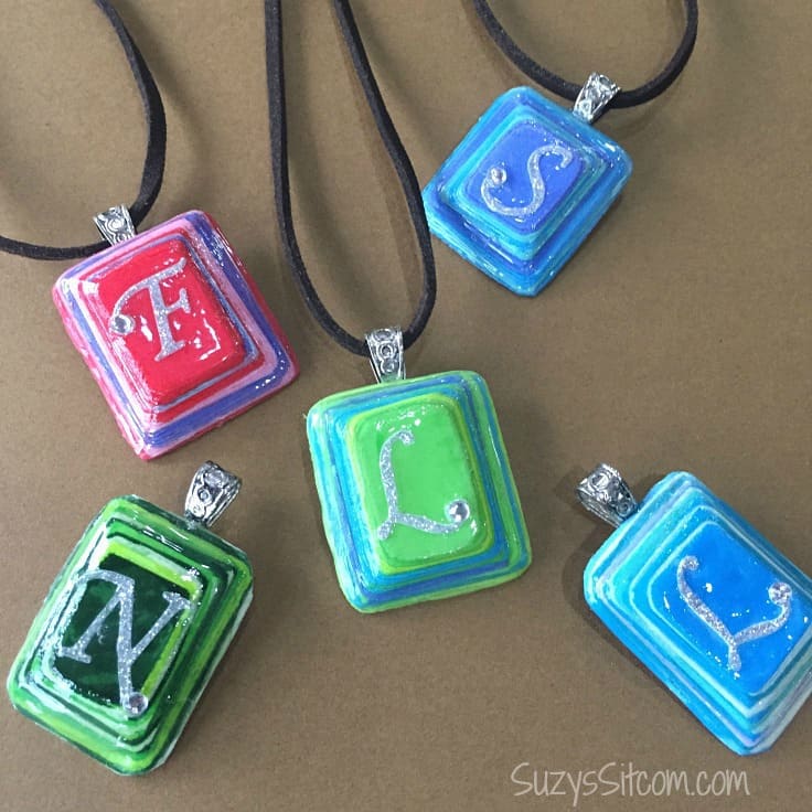 Layered paper DIY jewelry charms.