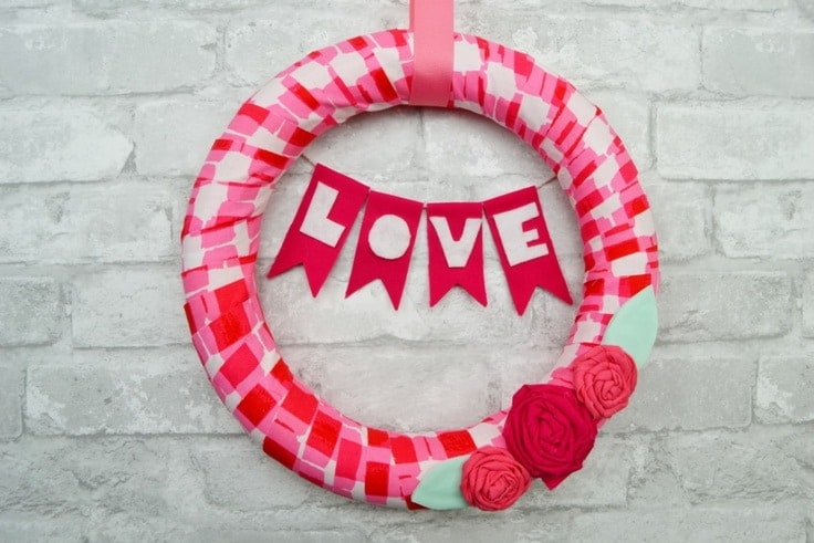 A Valentine's Day wreath made out of fabric scraps