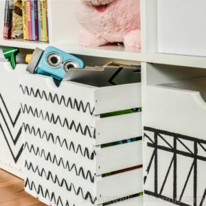 Learn how to paint wood crates with this simple tutorial! These wood crate storage ideas are perfect for storing toys, books, games, DVDs, and more!