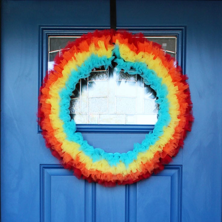 Rainbow tulle wreath from One Mama's Daily Drama.