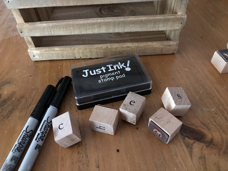 This is what you need to use to personalize a wood caddy - letter stamps, black ink, permanent markers, a wood caddy. 