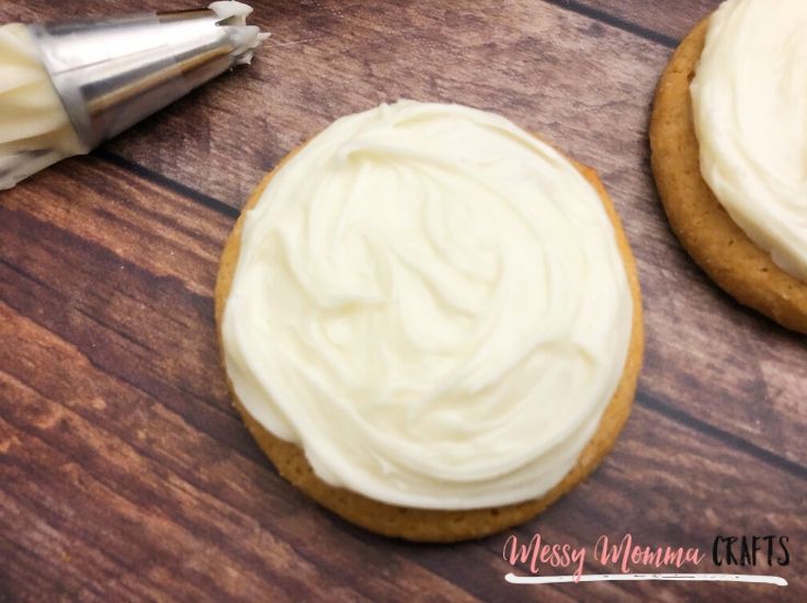 A sugar cookie with white frosting