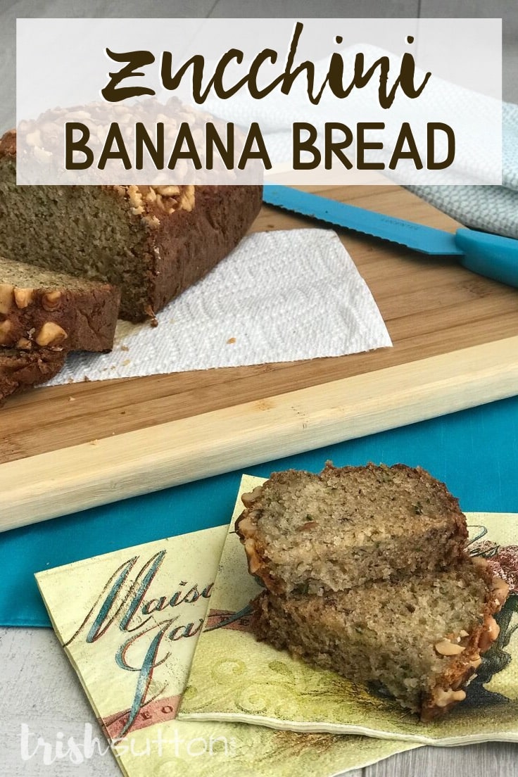 slices of zucchini banana bread on a yellow napkin along with a loaf of bread on a cutting board