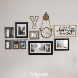 A family photo gallery wall displayed as farmhouse style home decor in a living room