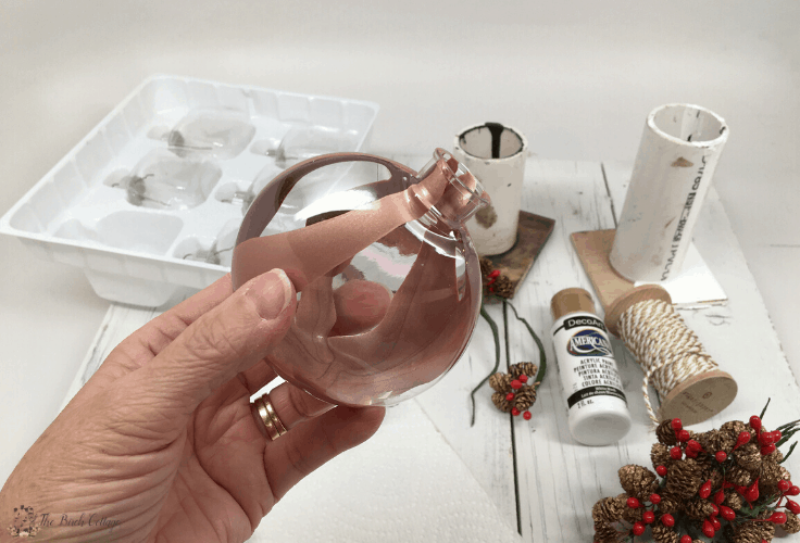 Learn how easy it is to paint clear plastic or glass Christmas ornaments using acrylic paint to create custom colored Christmas ornaments.