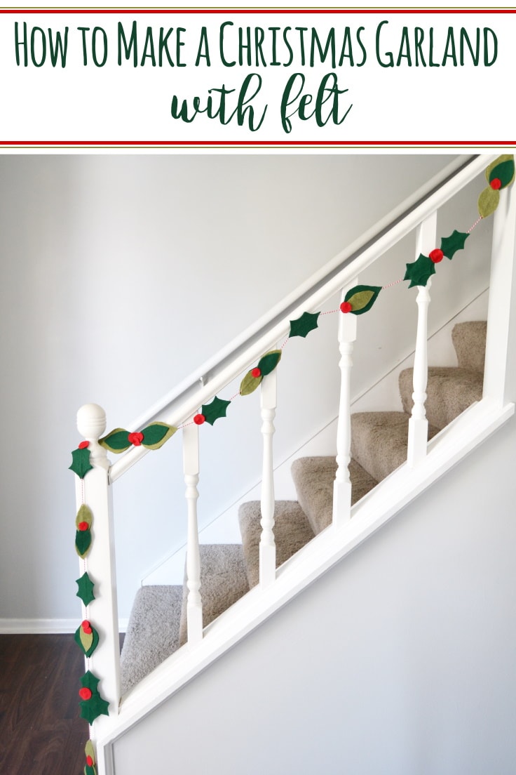 Felt leaf and berry garland draped on the railing of a staircase