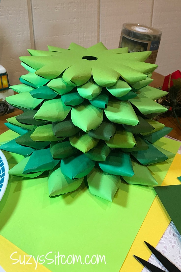 Add more layers to the tree. Make each layer smaller than the one before it. 