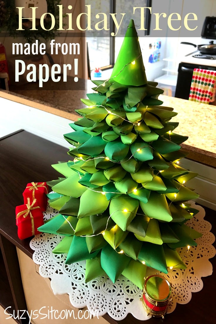Create a beautiful holiday tree centerpiece with paper!  Simple paper folding tutorial.