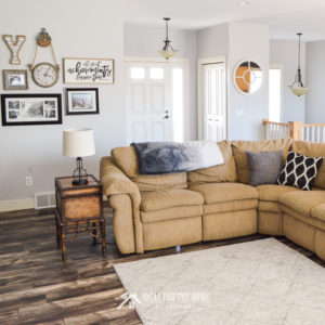 Tan sectional sofa in a farmhouse style living room