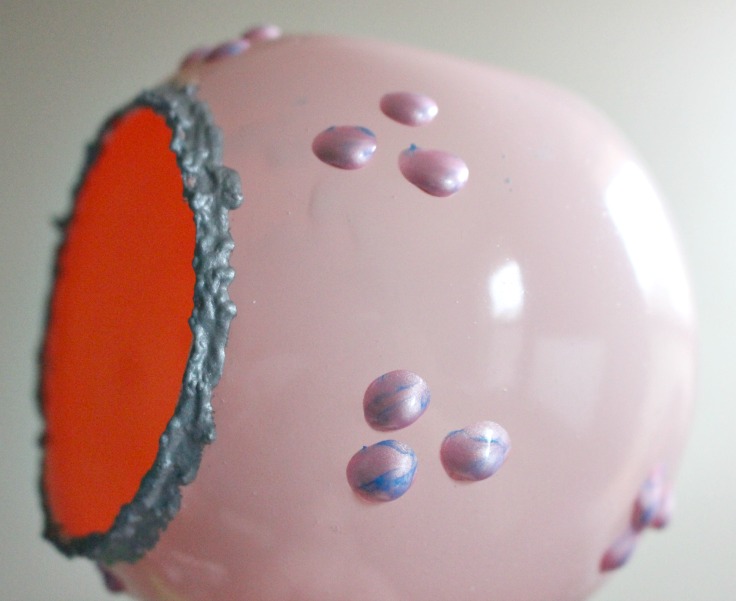 side view of vintage ornament with polka dots