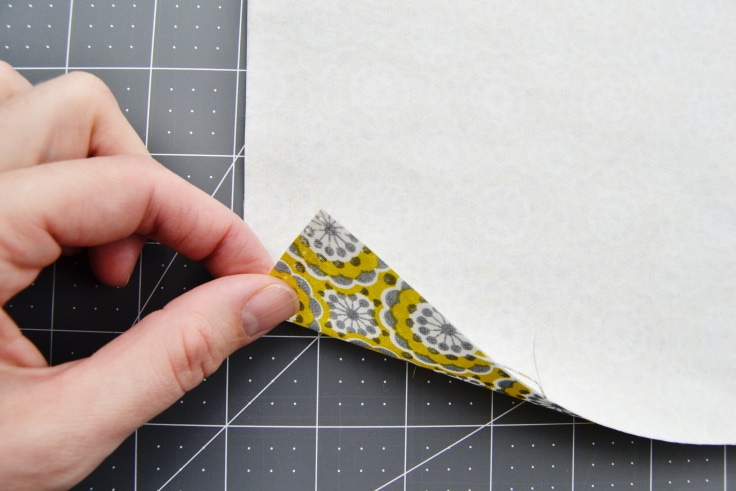 the fusible interfacing attached to the back of one of the fabric rectangles.
