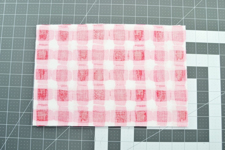 the second woven cotton layer added on top of the stack