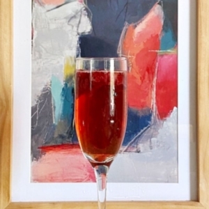 raspberry mimosa in front of colorful picture