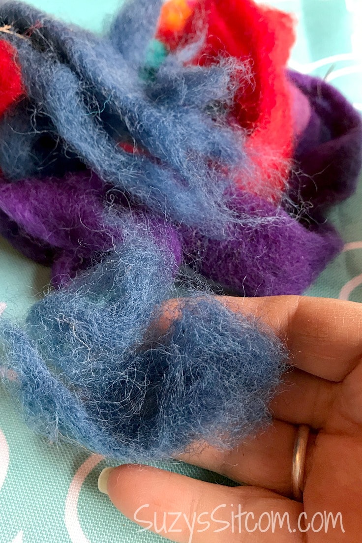 Close up of blue, purple and red wool