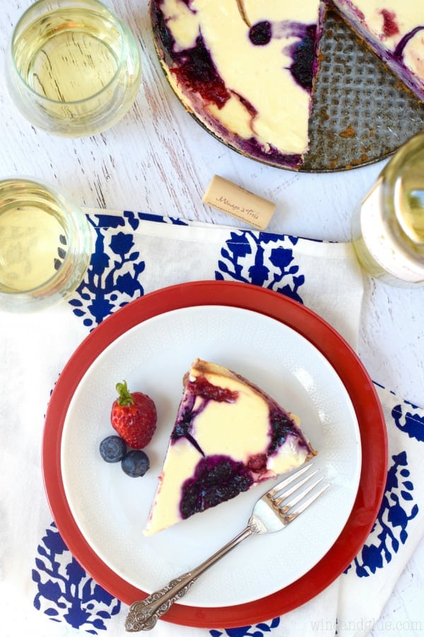 A slice of berry cheesecake taken from above 