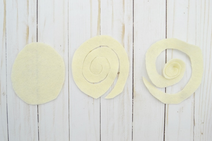 pieces of felt cut into swirl shapes