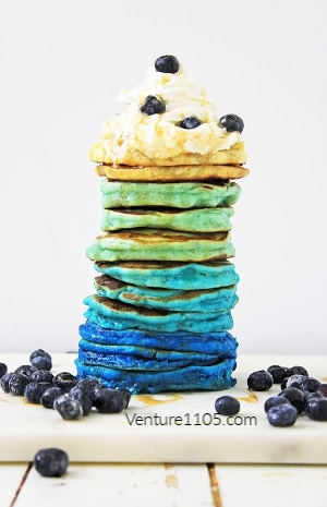 a stack of blueberry pancakes 