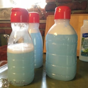 homemade fabric softener in three bottles