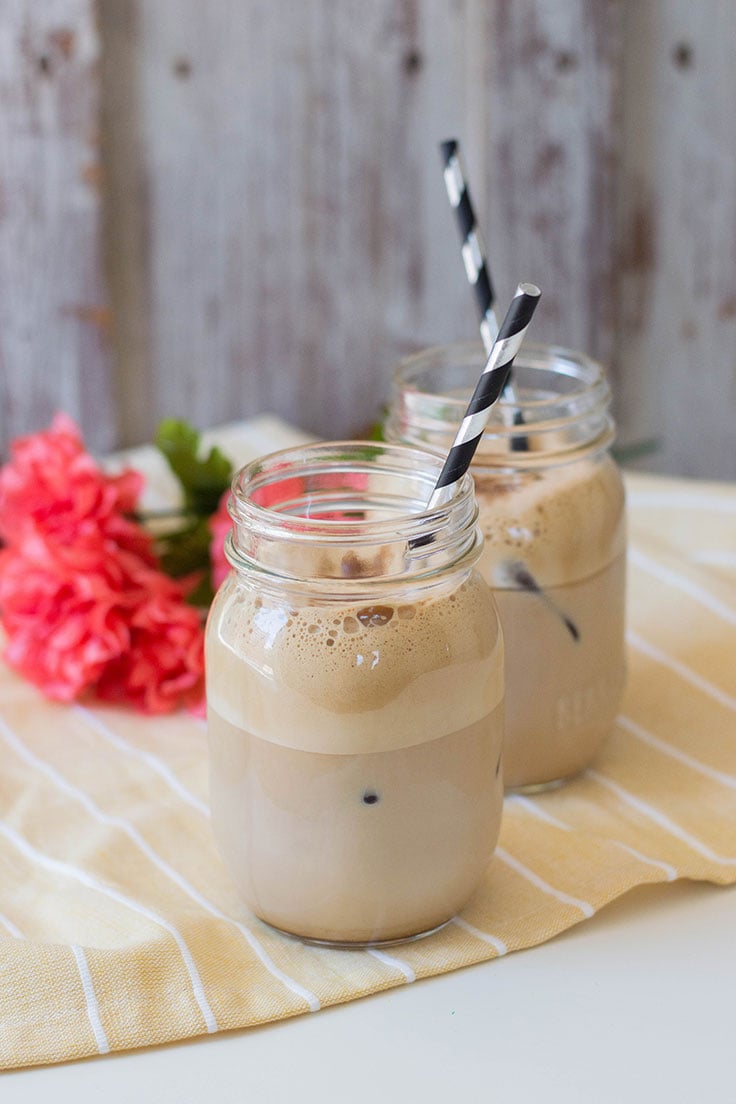 2 Iced coffee drinks with black and silver straws