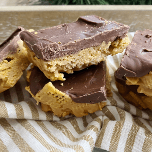 These Chex Scotcheroo Bars are made with peanut butter, butterscotch and chocolate. They are sure to make your sweet tooth happy.