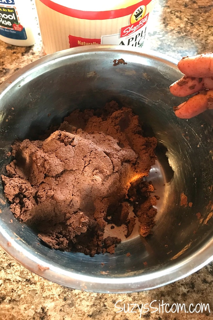 Cinnamon ornament dough in a mixing bowl.
