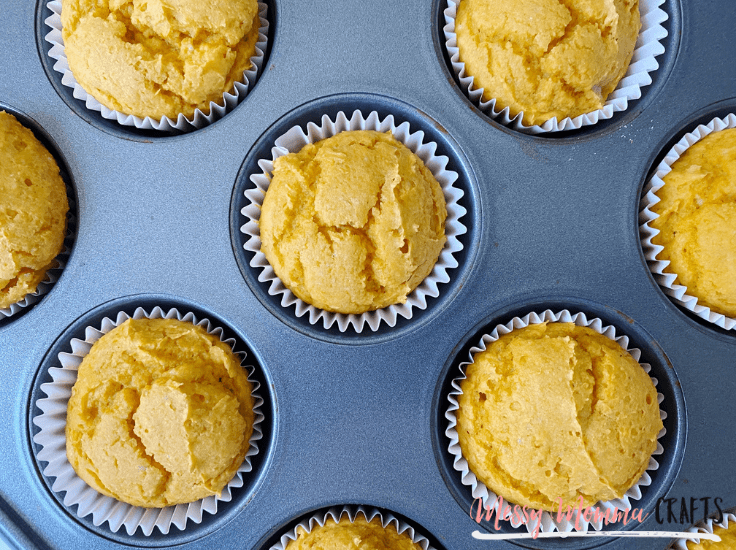Pumpkin Cupcakes fresh out of the oven smell like fall. Let them cool and add a little cream cheese frosting.