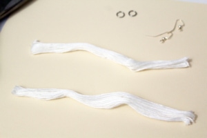 white embroidery thread bundle cut in half