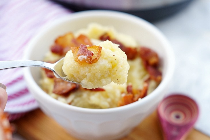 A spoonful of mashed potatoes made in the instant pot 