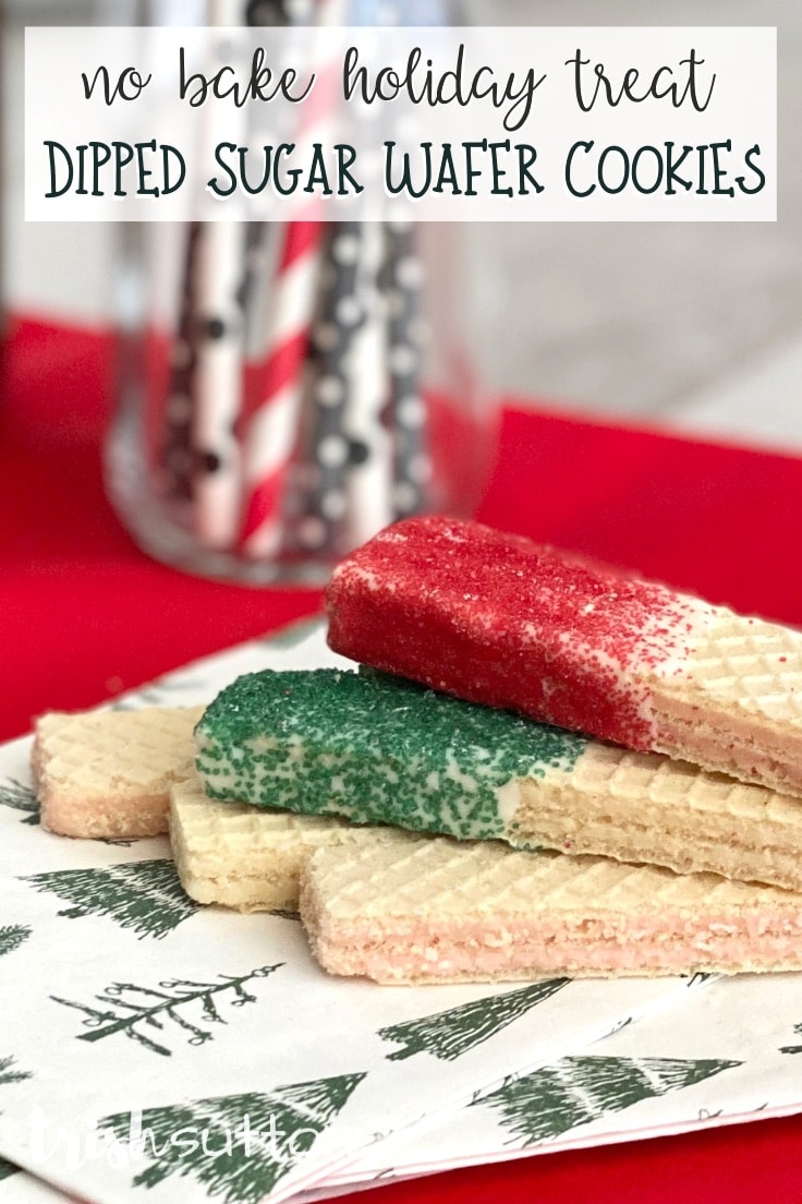 Stack of no bake Dipped Sugar Wafer Cookies sprinkled with red and green.