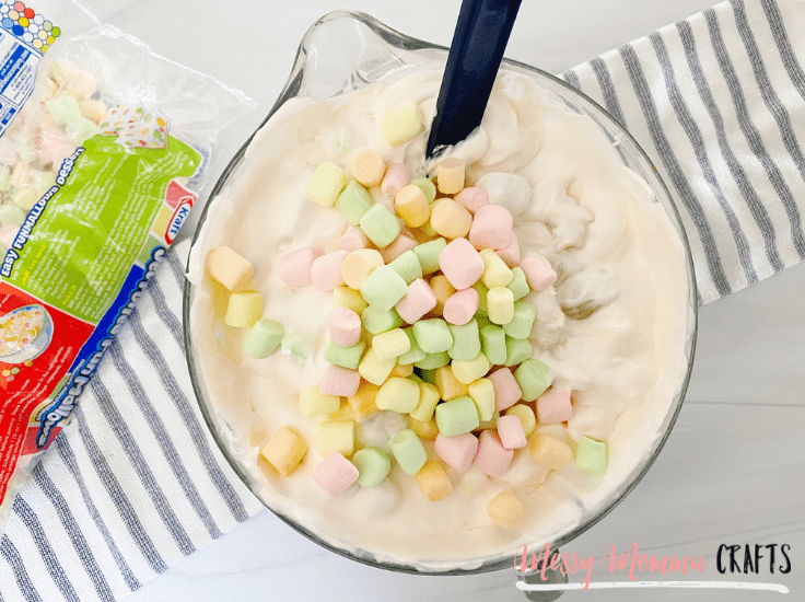 This Ambrosia Fruit Salad is the perfect no bake side dish for family dinners, just whip it up and serve it with extra marshmallows on top.