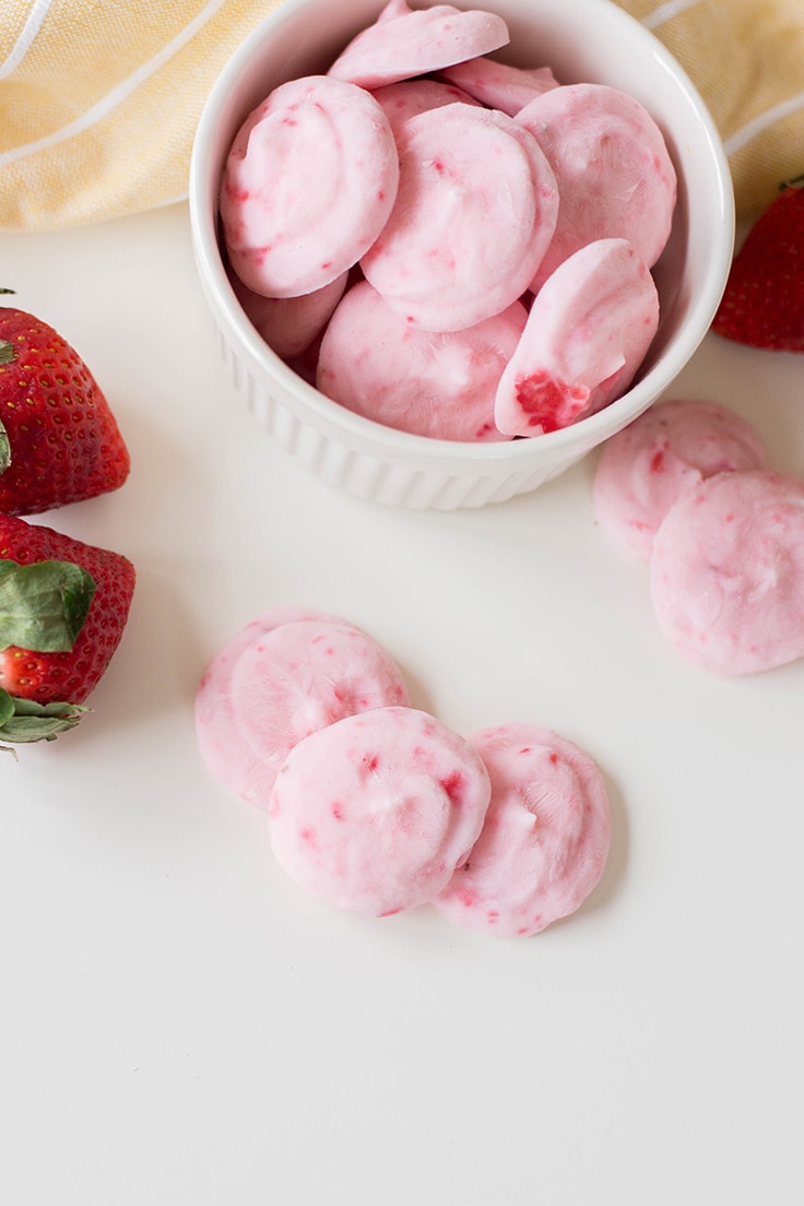 Three pieces of our Easy Strawberry Yogurt Bites, from bird's eye view.
