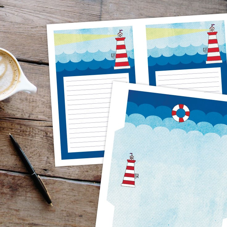 Lighthouse stationery with lined pages and an envelope.