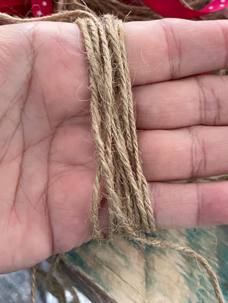 Jute string wrapped around a hand about 20 times.