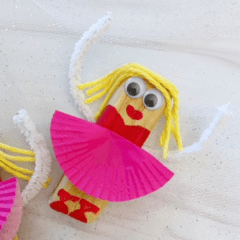Wooden ballerina craft for kids with a cupcake liner tutu.