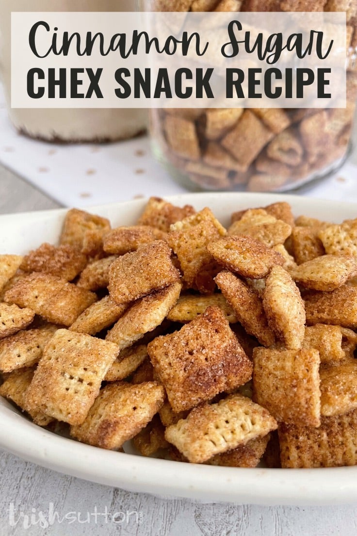 Cinnamon Sugar Chex Snack on a white napkin with a bowl of treats in a jar in the background.