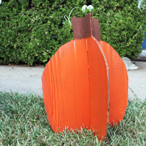 Cardboard pumpkin cutout.