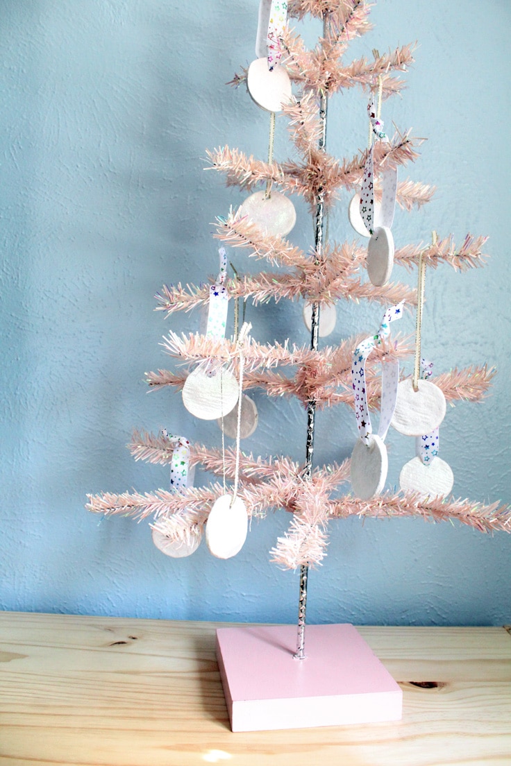 Pink Christmas tree decorated in glitter salt dough ornaments.