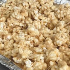 Prepared pan filled with Caramel Marshmallow Popcorn.