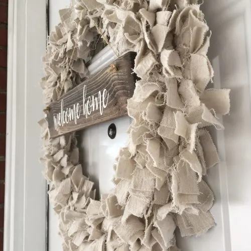 drop cloth rag wreath hanging on door