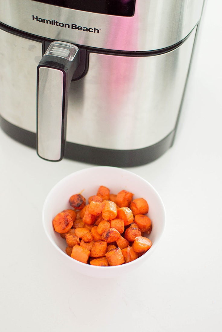 Bowl of cooked carrots.