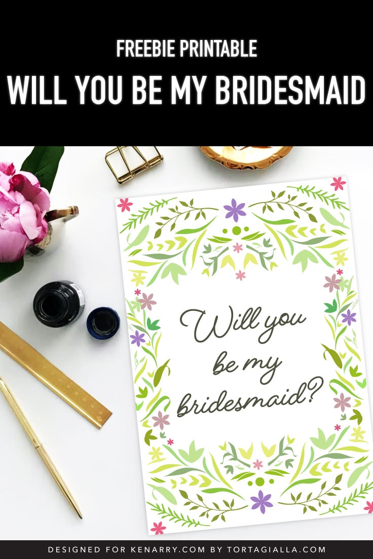 Preview of printable bridesmaid card printable on white desk with flower, stationery supplies to the side.